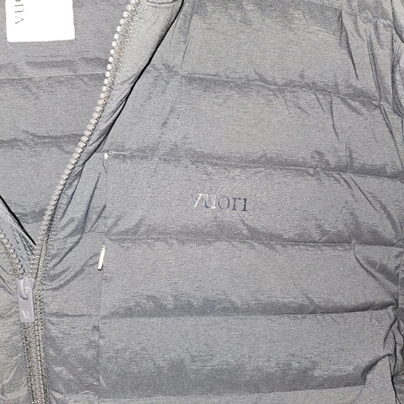 Vuori Black Puffer Jacket with High Collar and Slim Fit - Picture 3 of 7